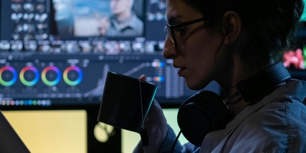 Editors reviewing AI funding reports and charts