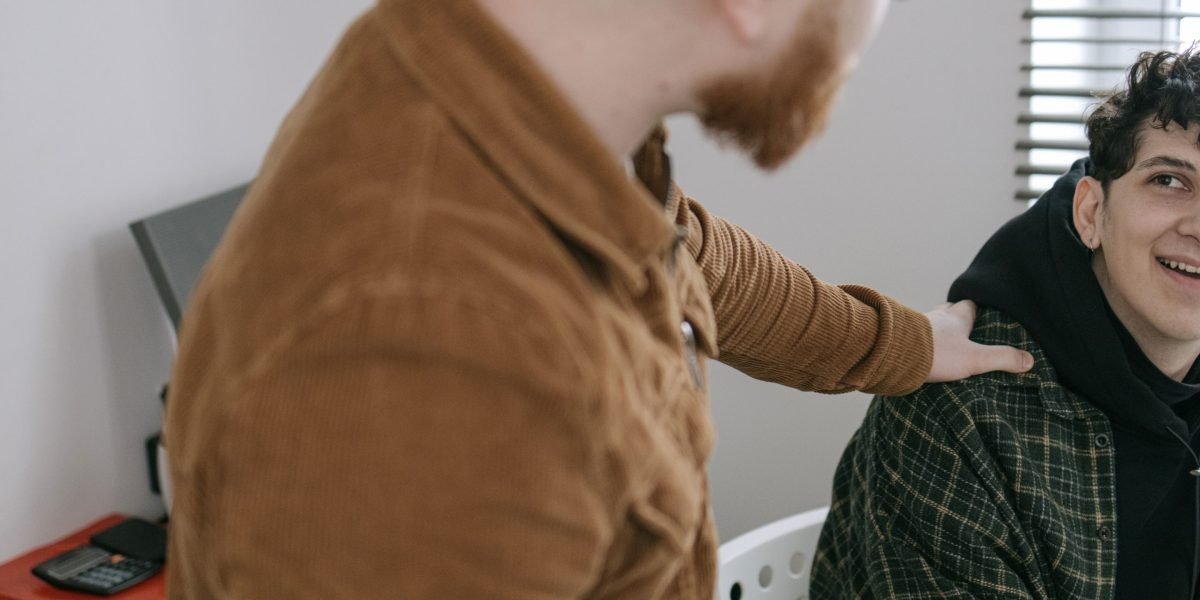 An experienced mentor guiding a startup founder, symbolizing strong partnership and operational support.
