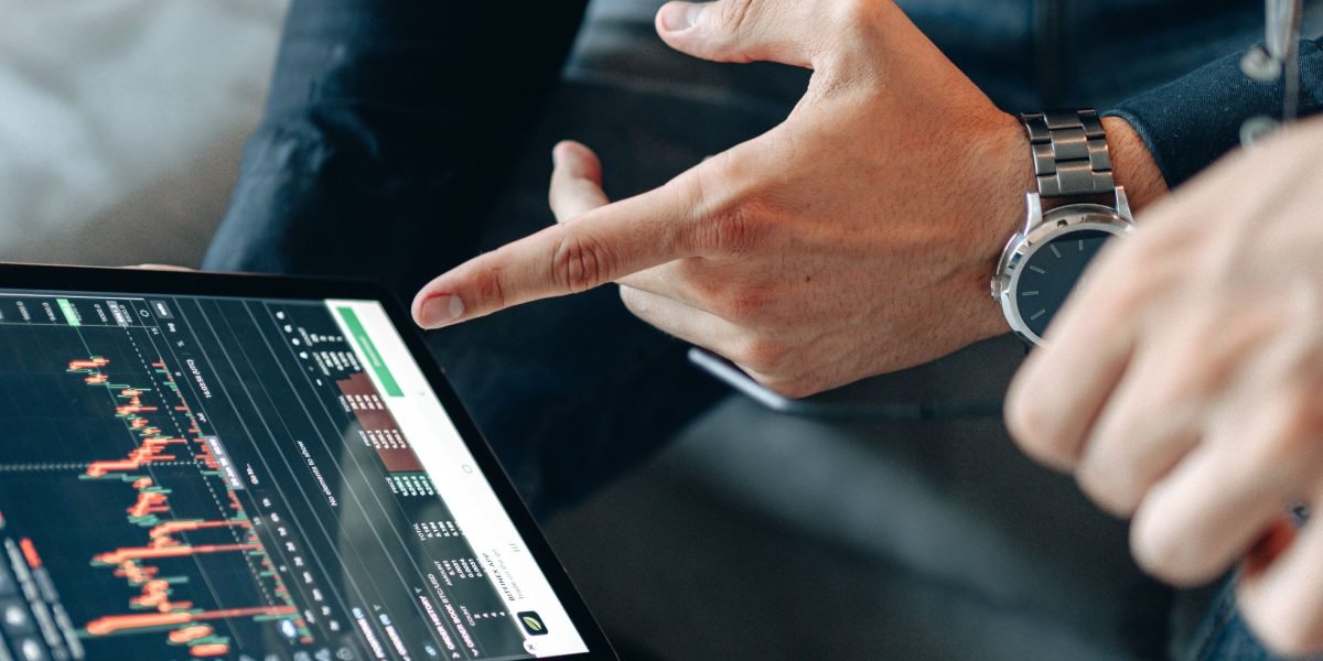 An investor focused on analyzing market trends and identifying opportunities amidst the noise.