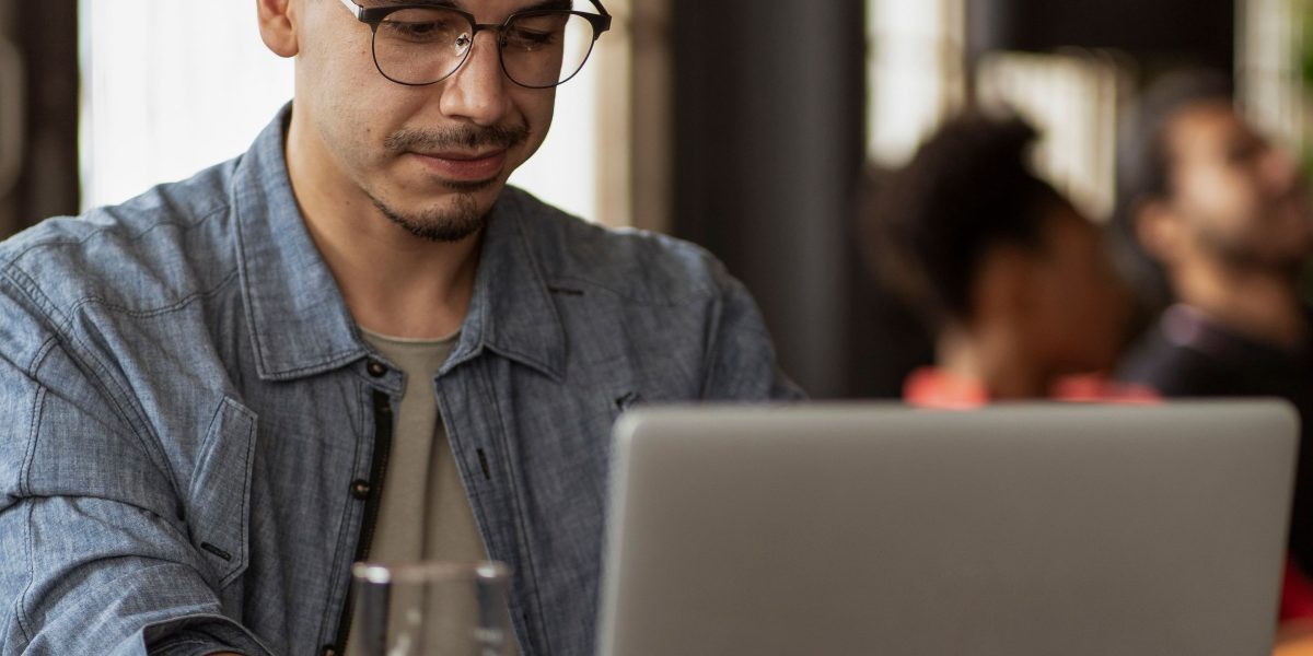 Professionals embracing flexible remote work in a comfortable, inspiring setting, reflecting Michigan's appeal.