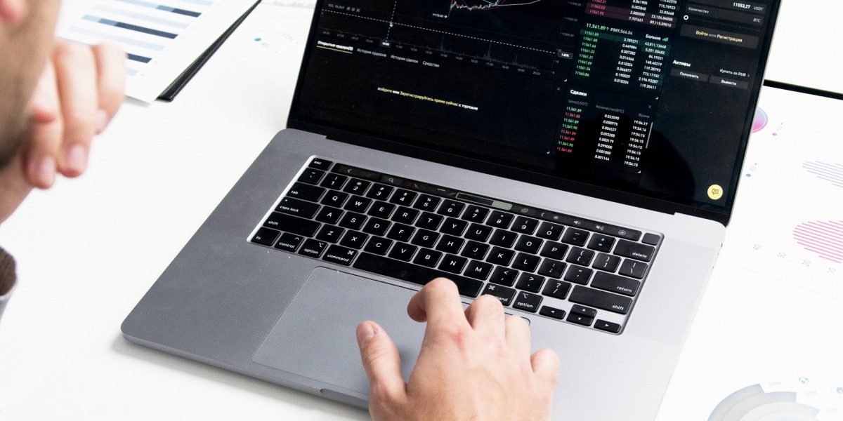 A professional analyzing market data, embodying the strategic nature of private equity in the AI funding ecosystem.