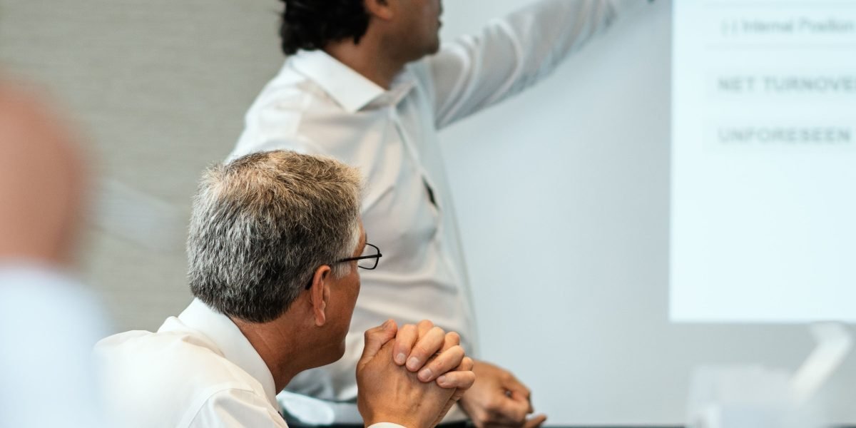 A business leader deep in thought, considering crucial decisions about customer service strategy.