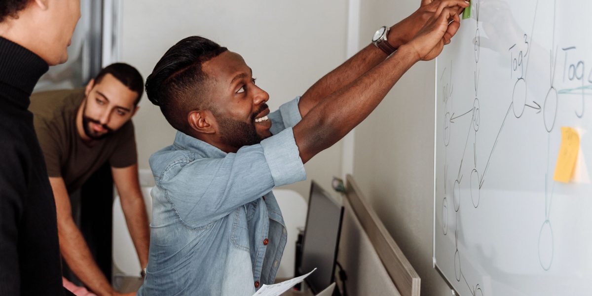 A customer support team collaborating, reflecting a blended approach with AI and human agents.
