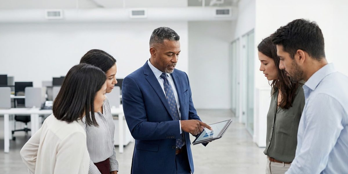 A diverse team working together, embodying a mission-driven company culture and collaborative spirit.