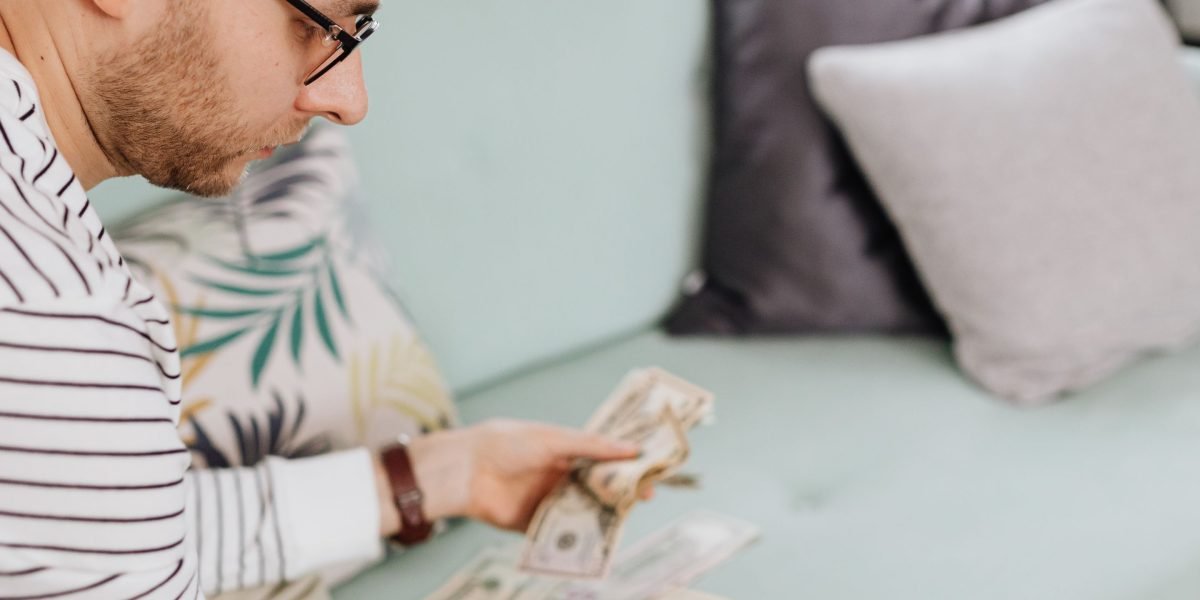 An individual meticulously planning their financial future, emphasizing strategic investment decisions.