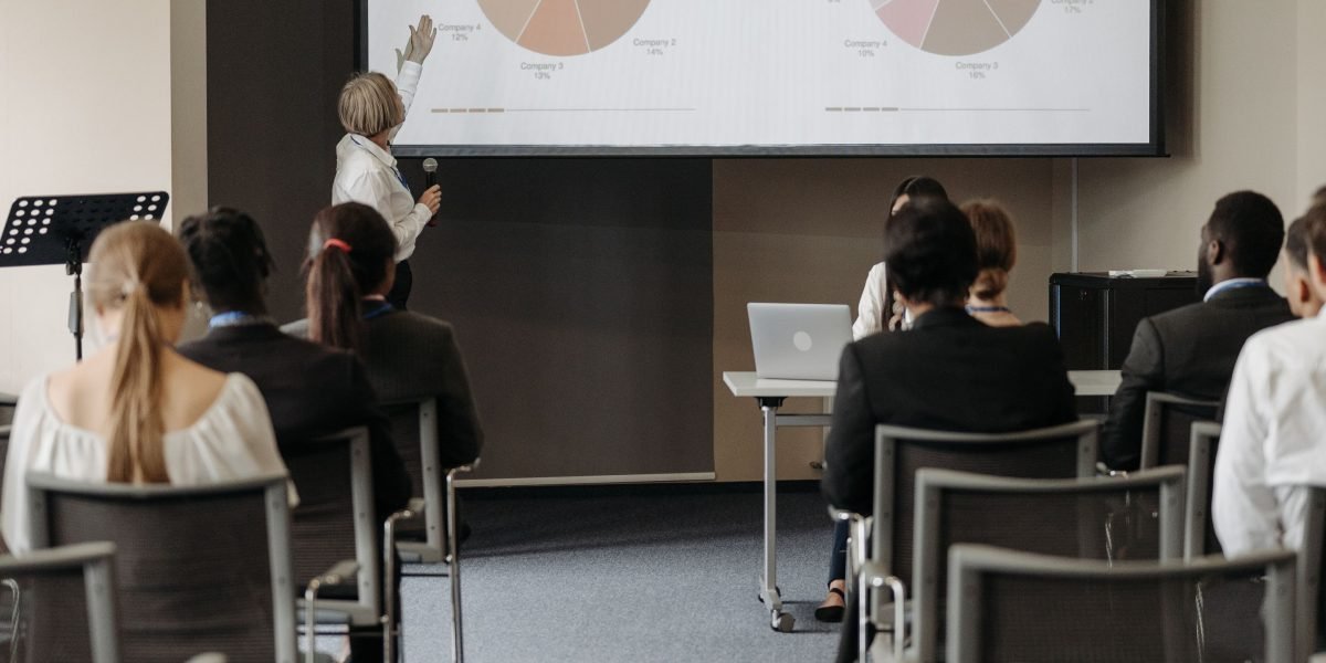 A diverse team collaborating and discussing market trends across different time zones.