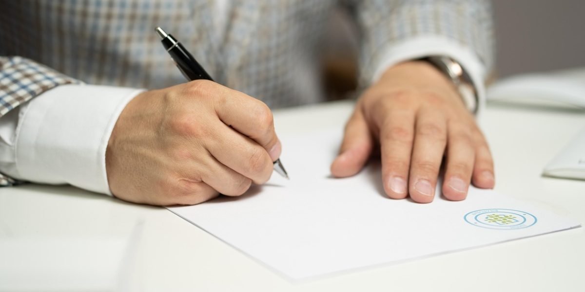 A meticulous professional conducts thorough due diligence, examining documents to assess an AI company's viability.