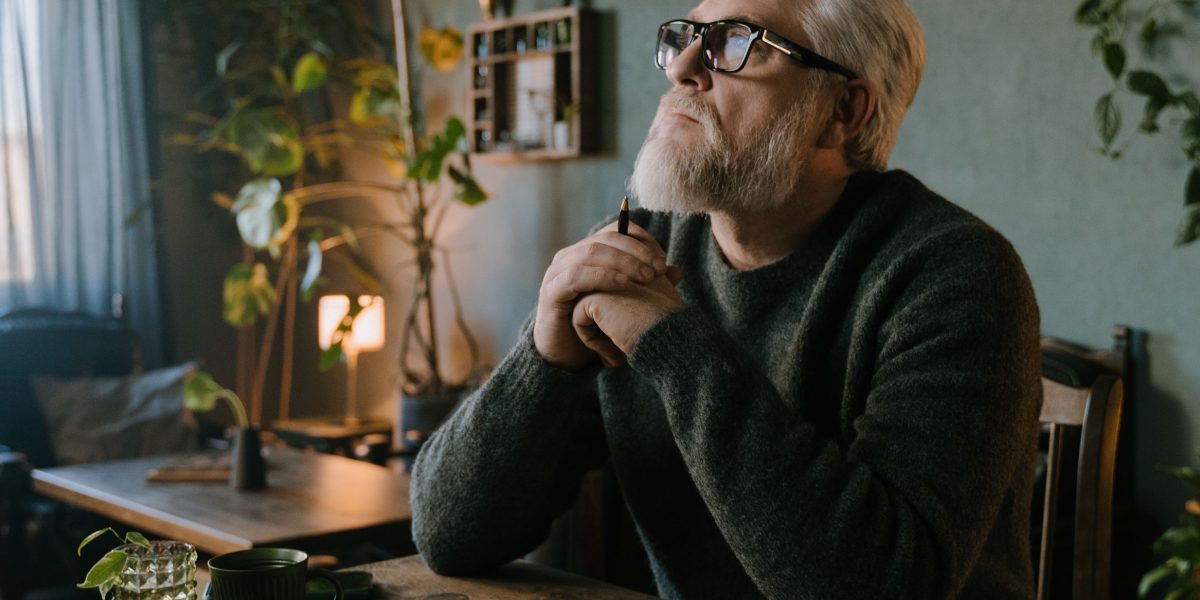 A person concentrates intently, reflecting the deep analysis required in specialized remote research roles.