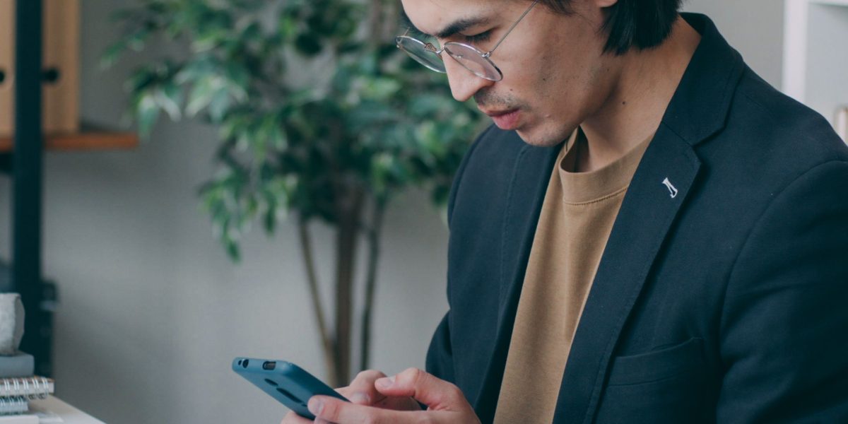 An individual focused on work, benefiting from streamlined operations due to AI automation.