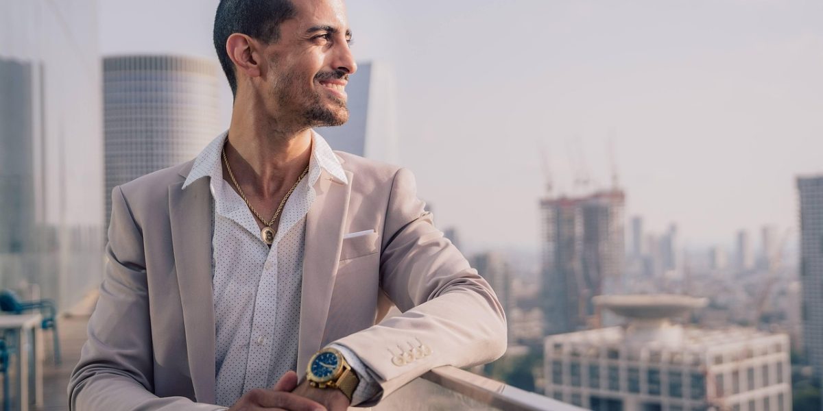 A successful founder seals a new funding deal, demonstrating confidence and strategic partnerships.