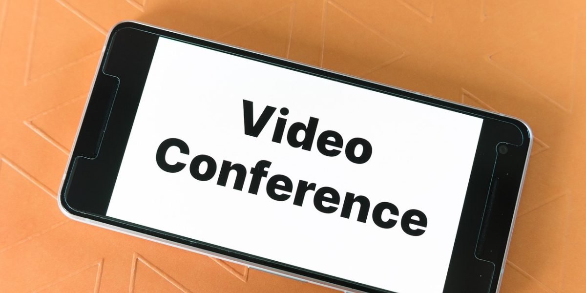 A diverse team collaborating effectively through a video call, representing the rise of distributed teams and global talent pools.