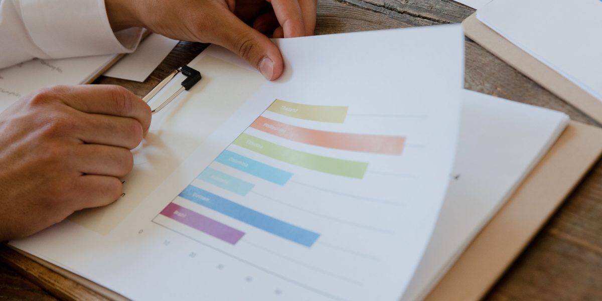 A professional examining market data to identify emerging industry trends and opportunities.