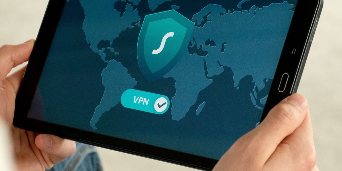 An individual thoughtfully considering or securing personal data in a digital context.