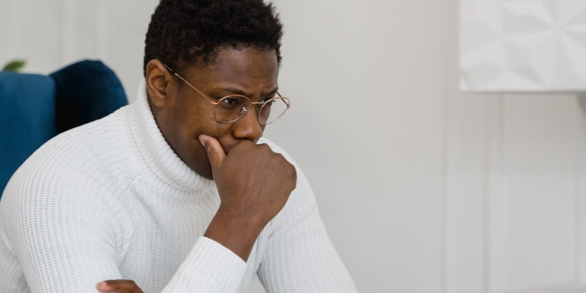 A person thoughtfully considering complex investment options and strategic decisions.
