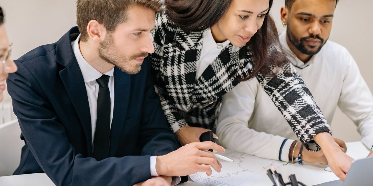 Professionals collaborating seamlessly, illustrating the integration and automation of AI-powered workflows.