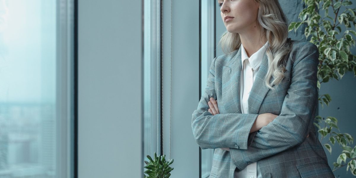 A business leader deep in thought, sifting through information to make strategic decisions in a complex environment.