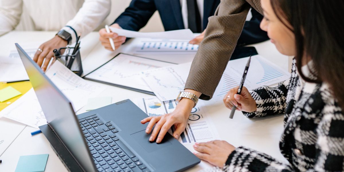 A diverse group of professionals collaborating effectively in a remote work setting, showcasing modern talent dynamics.